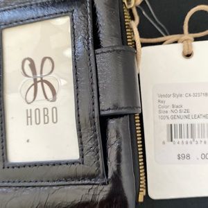 Black leather wallet with change or lipgloss pouch. As listed or best offer.